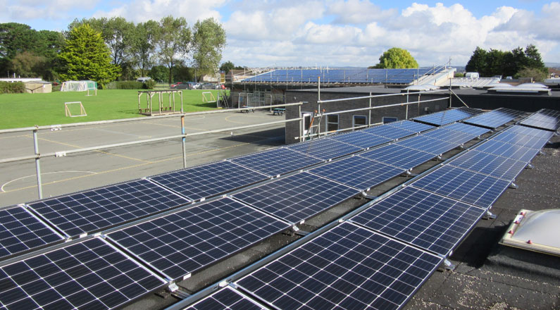 Plymstock School, 100.24kW system we installed for TEC, pictured with an existing 36.75kW system we installed at the school in 2011.