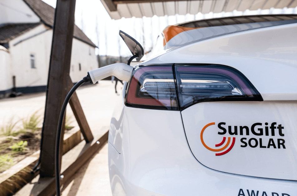 SunGift Tesla charging at SunGift Solar Car Port